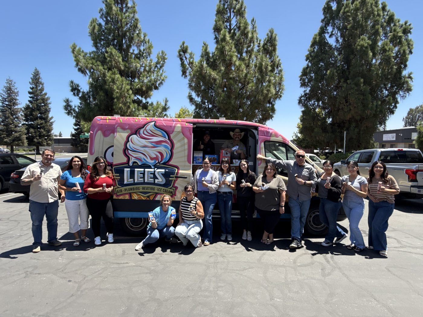 Community event group with the Lee's ice cream truck